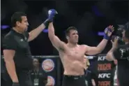  ?? GREGORY PAYAN — THE ASSOCIATED PRESS ?? Chael Sonnen is declared the victor against Wanderlei Silva, of Brazil, during a mixed martial arts bout at Bellator 180 early Saturday, June 25, 2017 in New York. Sonnen won via unanimous decision.