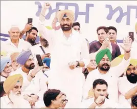  ?? BHARAT BHUSHAN/HT ?? AAP leader and ousted leader of opposition Sukhpal Singh Khaira addressing the party workers at the convention in Bathinda on Thursday.