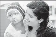  ?? STAN CARROLL/THE COMMERCIAL APPEAL ?? Kushi Patel, 7, is “clear,” says her mother Vaishali, but the girl must still return to St. Jude every 15 days for treatment.