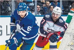  ?? KEVIN SOUSA GETTY IMAGES ?? Tyler Ennis, pulling away from Brandon Dubinsky of the Columbus Blue Jackets on Monday, had perhaps his best game as a Leaf, including a key goal in the win.