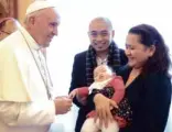  ??  ?? POPE Francis blesses 5-month-old Katie, held by parents John Paul and Aileen Cunanan.