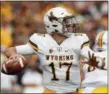  ?? THE ASSOCIATED PRESS FILE ?? Wyoming quarterbac­k Josh Allen throws a pass during September 2017 game.