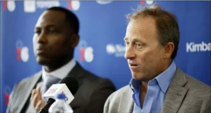  ?? MATT ROURKE — THE ASSOCIATED PRESS ?? Incoming general manager Elton Brand, left, listens to owner Josh Harris speak at the Sixers’ practice facility in Camden, N.J., on Thursday.