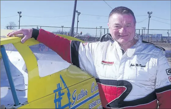  ?? PHOTOS BY BERND FRANKE/ TRIBUNE STAFF ?? Merrittvil­le Speedway Wall of Fame Davey Moore was behind the wheel of a modifi ed 358 race car for the fi rst since 1999 at the track’s spring practice Saturday in Thorold.