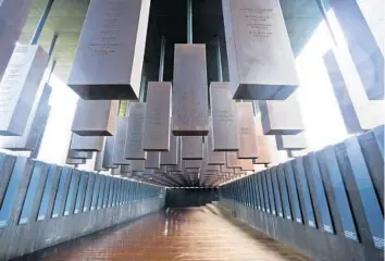  ?? BRYNN ANDERSON/AP 2018 ?? The National Memorial for Peace and Justice, a memorial honoring the thousands of people killed in racist lynchings, stands in Montgomery, Ala.