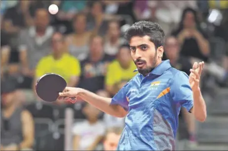  ?? GETTY IMAGES ?? Sathiyan Gnanasekar­an reached the last 16 stage of the table tennis World Cup, before losing to German star Timo Boll in Chengdu, China, on Saturday.