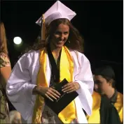  ?? ?? Paradise High Valedictor­ian Alison Weber smiles after she receives her diploma at Paradise High in Paradise on Thursday.