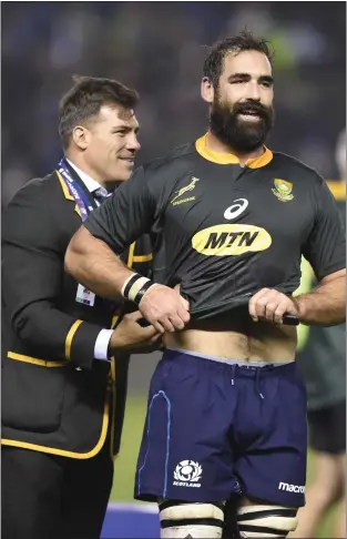 ??  ?? Jock Bok – South Africanbor­n Josh Strauss collects a special souvenir last weekend