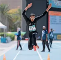  ??  ?? Khalifa Alamiri wins gold medal in long jump in Dubai.