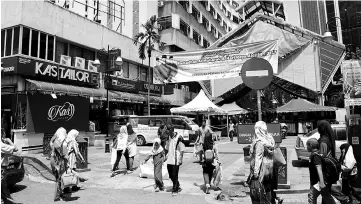  ??  ?? Kuala Lumpur’s Jalan Masjid India is a shopping haven for Muslims to do their festive needs. - Bernama photo
