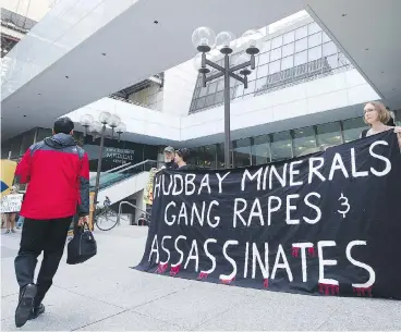  ?? NATHAN DENETTE / THE CANADIAN PRESS ?? Protesters have demonstrat­ed Canadian mining companies such as HudBay Minerals Inc. regarding alleged abuses in other countries, but until recently Canadian judges tend to send such cases back to the country where they occurred.