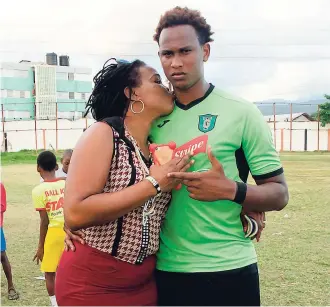  ?? SHORN HECTOR ?? Tivoli Gardens FC’s Khalfane Richards and his mother, Kayann Jackson, after the game against arch-rivals Arnett Gardens FC.