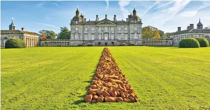  ??  ?? Bricks and stones: Richard Long’s A Line in Norfolk on display at Houghton Hall