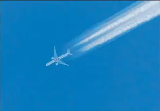  ?? Photograph: Nestek ?? The familiar sight of aircraft trails in the skies.