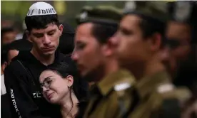  ?? Photograph: Francisco Seco/AP ?? Mourners attend the funeral of Israeli soldier Abraham Cohen at the Mount Herzl cemetery.