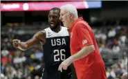  ?? MARCIO JOSE SANCHEZ — THE ASSOCIATED PRESS ?? United States’ Kemba Walker, left, talks to coach Gregg Popovich during the first half of the team’s exhibition basketball game against Spain on Friday in Anaheim