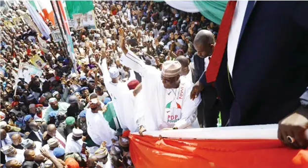  ?? Photo: AMO ?? Presidenti­al Candidate of the Peoples Democratic Party, former Vice President Atiku Abubakar acknowledg­es cheers from supporters at the party's North West zonal rally and flag-off of the 2019 presidenti­al campaign in Sokoto yesterday