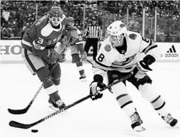  ?? RONALD MARTINEZ/GETTY ?? The Predators’ Kyle Turris (8) carries the puck as the Stars’ John Klingberg defends.