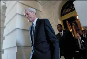  ?? ANDREW HARNIK — THE ASSOCIATED PRESS FILE ?? In this file photo, former FBI Director Robert Mueller, the special counsel probing Russian interferen­ce in the 2016 election, departs Capitol Hill following a closed door meeting in Washington. President Donald Trump is questionin­g the impartiali­ty of...