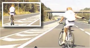  ?? Louise Kay ?? ●●The cyclist crossing the M60 near Bredbury