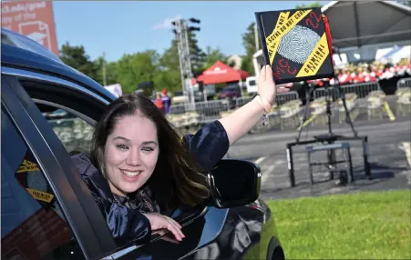  ?? PHOTO BY DAVID DEBALKO ?? Many graduates decorated their caps and cars for the 2022 Commenceme­nt.