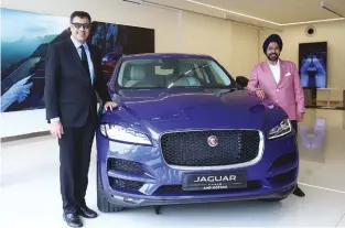  ??  ?? Rohit Suri president and managing director, Jaguar Land Rover India Ltd (JLRIL) and Gurmeet Singh Anand, managing director, AMP Group at the opening