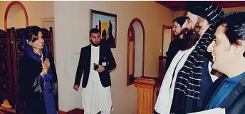  ?? — AFP photo ?? Hina Rabbani Khar (left) speaking with Afghanista­n’s Foreign Minister Amir Khan Muttaqi (second right) during her official visit in Kabul.