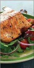  ?? GETTY IMAGES ?? This easy mustard and brown sugar glaze turns roasted salmon into crave-worthy fare.