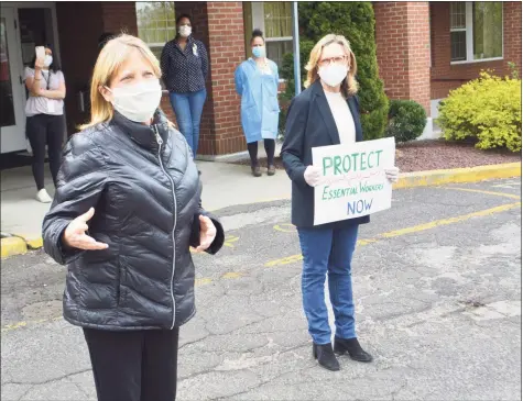  ?? ?? State Sen. Julie Kushner, D-Danbury, recently received the Amistad Award from Connecticu­t People’s World, which is tied to the Communist Party USA. She is pictured on the right thanking health care workers at Middlesex Health Care in Middletown.