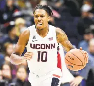  ?? Stephen Dunn / Associated Press ?? Guard Brendan Adams has been one of UConn’s most improved players this season.