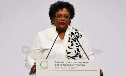  ?? ?? Mia Mottley, the prime minister of Barbados, delivers her speech at the financial summit in Paris on 22 June. Photograph: Ludovic Marin/ AP