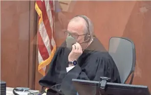  ?? COURT TV/POOL VIA AP ?? In this screen grab from video, Hennepin County Judge Peter Cahill presides over jury selection Tuesday in Minneapoli­s.