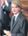  ?? FRED CHARTRAND/THE CANADIAN PRESS ?? Governor General Julie Payette’s son, Laurier Payette-Flynn, applauds his mother during a ceremony in Ottawa on Monday.