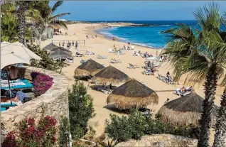  ?? STEVE HAGGERTY/TNS ?? Enjoy sand, sun and shade by choosing a beachside palapa at Hacienda del Mar Resort in Los Cabos.