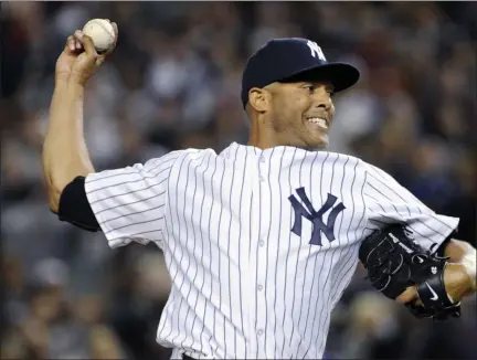  ?? BILL KOSTROUN — ASSOCIATED PRESS FILE ?? Yankees’ Mariano Rivera pitches against the Rays in September 2013 at Yankee Stadium.