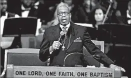 ?? PAUL SANCYA/AP ?? Rev. Jasper Williams, Jr., delivers a eulogy during the funeral service for Aretha Franklin.