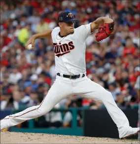  ?? AP PHOTO BY JOHN MINCHILLO ?? American League pitcher Jose Berrios, of the Minnesota Twins, throws during the third inning of the MLB baseball All-star Game against the National League, Tuesday, in Cleveland.