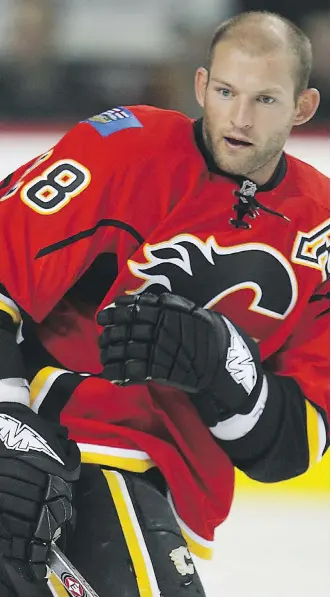  ??  ?? Robyn Regehr, seen in 2008 with the Calgary Flames, says strong play “created more and more momentum” for the 2014 Los Angeles Kings, who were down 0-3 but beat the San Jose Sharks in seven games.