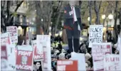  ??  ?? People in Seattle gather in protest against the election of Donald Trump as US president.