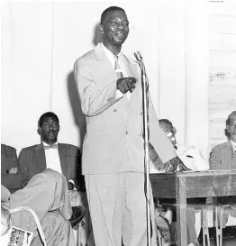  ?? GLEANER ARCHIVES ?? Jonathan Grant, acting minister of Agricultur­e addressing the Summer School for Senior field officers of the Co-ordinated Extension services at the University College of the West Indies.