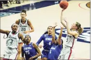  ?? David Butler II / USA TODAY ?? UConn’sPaige Bueckers (5) shoots against Seton Hall in the first half on Wednesday in Storrs.