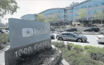  ?? JEFF CHIU
THE ASSOCIATED PRESS ?? A woman opened fire at YouTube headquarte­rs Tuesday, setting off a panic among employees and wounding several people before fatally shooting herself, police and witnesses said.