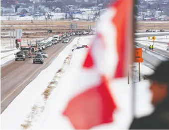  ?? JOHN MORRIS / REUTERS FILES ?? Truck drivers protesting COVID-19 vaccine mandates in a convoy on the Nova Scotia/new Brunswick provincial boundary last weekend in Fort Lawrence, N.S.