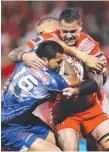  ??  ?? Tonga’s Andrew Fifita tackling.