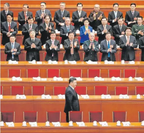  ??  ?? El presidente Xi Jinping, en la primera sesión del pleno anual de la Asamblea Nacional Popular EFE