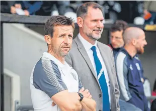  ?? Picture: SNS. ?? Struggling Dundee boss Neil McCann still has the backing of chief executive John Nelms, right, despite the dismal run of results.