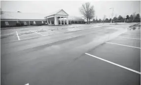  ?? MAX GERSH / THE COMMERCIAL APPEAL ?? The parking lot at Mississipp­i Boulevard Christian Church sits empty March 22 at the Southwind campus in Memphis.