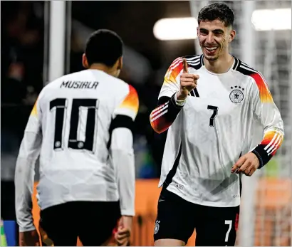  ?? ?? Kai Havertz celebrates with Bayern Munich’s Jamal Musiala during the win over France on Saturday