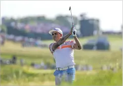  ?? DAVID J. PHILLIP/THE ASSOCIATED PRESS ?? Rickie Fowler hits on the 12th hole Thursday during the first round of the U.S. Open at Erin Hills in Erin, Wis.