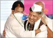  ?? PIC/PTI ?? New KPCC President D K Shivakumar (R) being greeted by AICC General Secretary and in-charge of Karnataka K C Venugopal